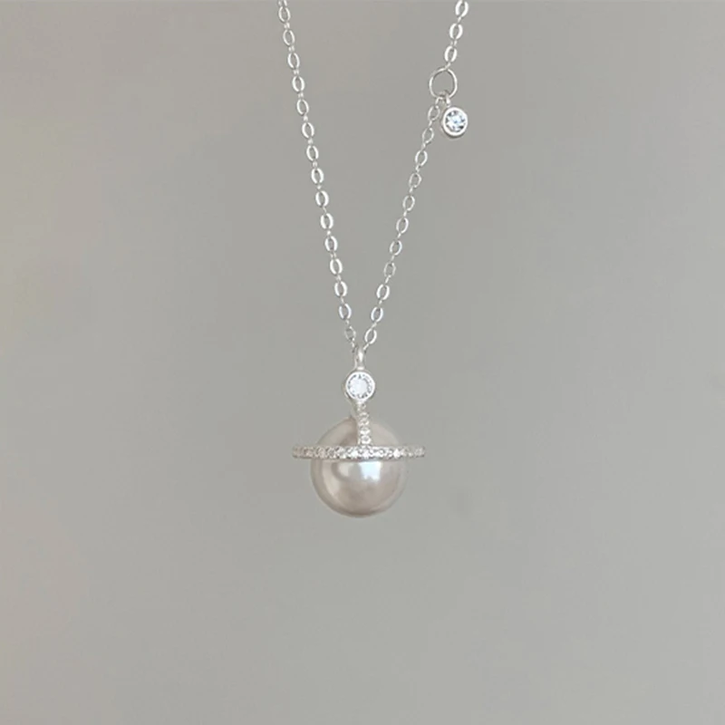 S925 فضة جميلة زحل قلادة المختنق قلادة بسيطة اللؤلؤ قلادة المرأة هدية الزفاف بوتيك غرامة مجوهرات
