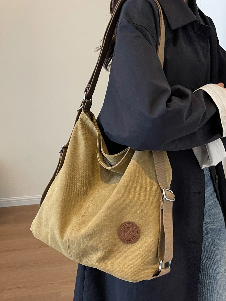 Lightweight and fashionable bag for women, new high-capacity tote bag, dual-purpose backpack, canvas commuting bag