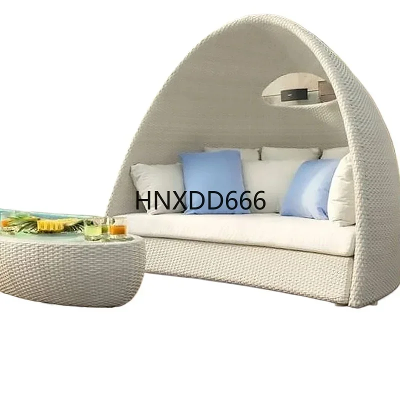 Outdoor rattan chair and coffee table set for leisure in a club, hotel balcony, or garden bed