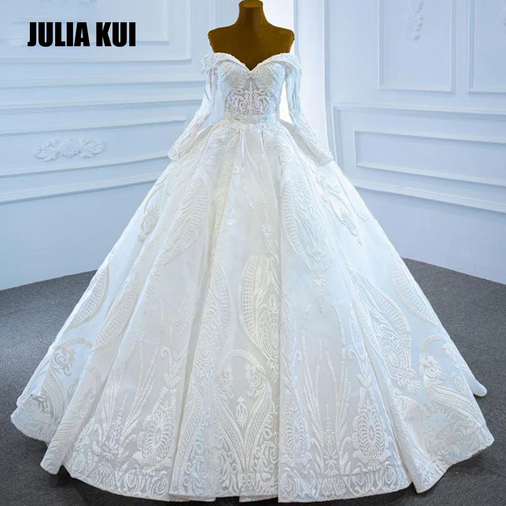 

Julia Kui Свадебные платья трапециевидной формы на заказ без бретелек с блестящим кружевом и длинным рукавом с корсетом на спине, свадебные платья