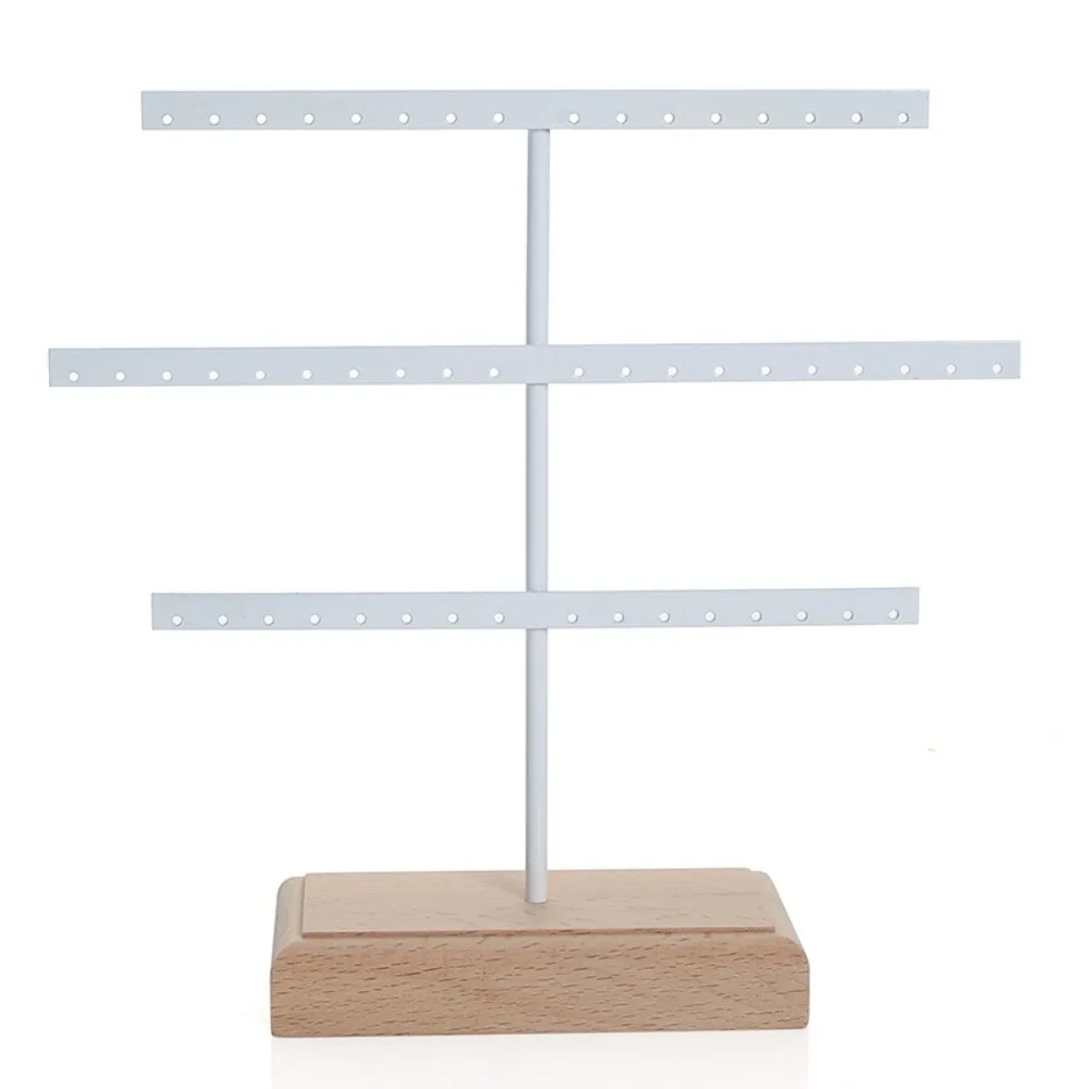 

Модная подставка для сережек с 52-мя отверстиями, металлическая деревянная основа, стеллаж для хранения ювелирных изделий, экономия места, браслет, держатель-гвоздик, настольный