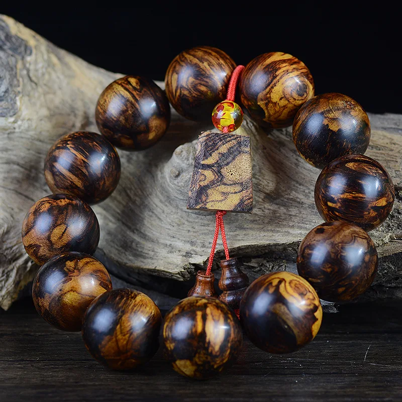 

Myanmar Small Leaf Huanghuali Fireworks Landscape Pattern Rattan Fragrant Wood Bracelet Similar to Hainan Huanghuali Descendent