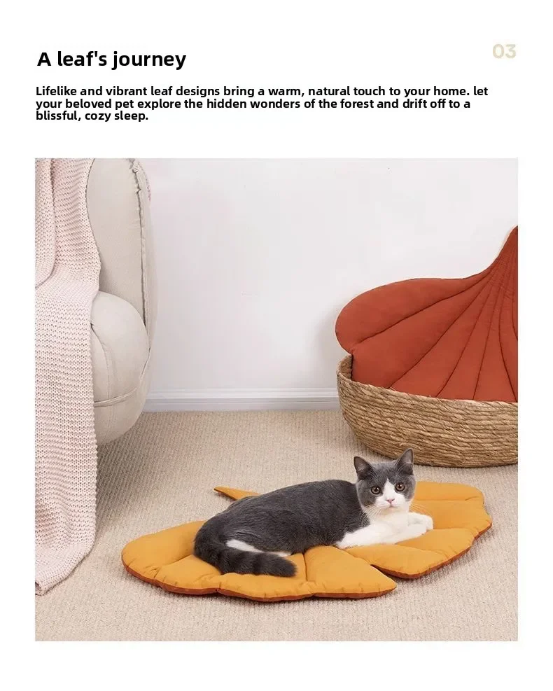 A gray and white cat rests on a large, orange, leaf-shaped Leaf Pattern Cat Sleeping Mat.