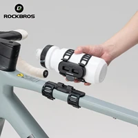 Soporte para botella de agua ROCKBROS, portavasos magnético portátil para bicicleta, soporte ligero Universal para portabotellas, absorción de impacto