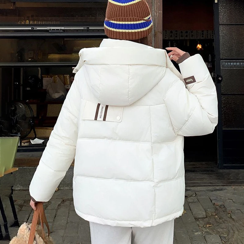 Chique donskatoenen gewatteerde jas dames korte overjas 2025 winter nieuwe losse college katoenen jas Koreaanse dikke capuchon warme parka