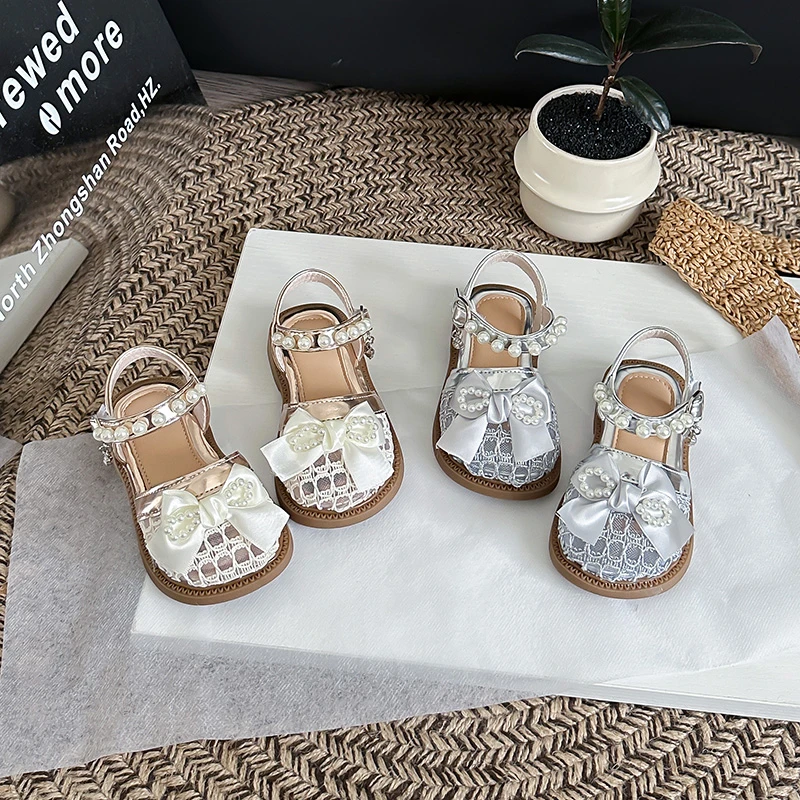 

Kid's Shoes Girls' Summer Sandals 2026 Pearl Bow Princess Shoes Breathable Mesh Fashion Soft Bottom Children's Shoes 22-31
