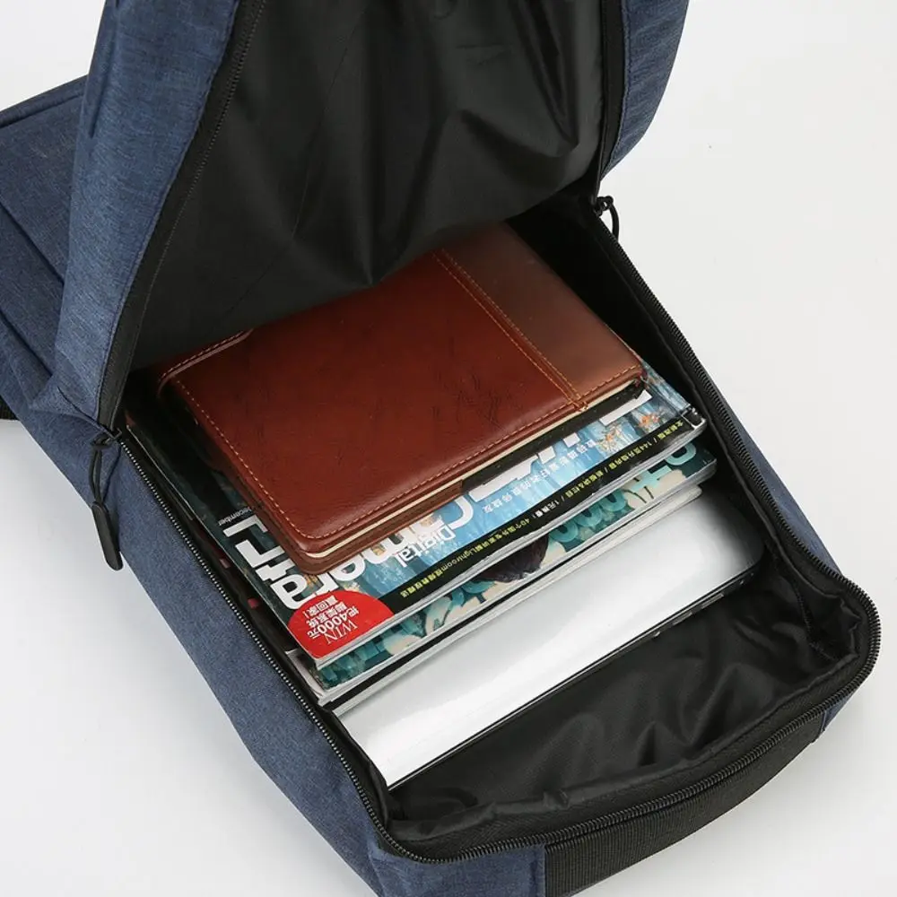 ผ้า Oxford อินเทรนด์กระเป๋าเป้สะพายหลังอเนกประสงค์สีดําสีเทาสีฟ้าสีแดง 15.6 นิ้วกระเป๋าเป้สะพายหลังนักเรียนล้างทําความสะอาดได้ธุรกิจ Rucksack Unisex