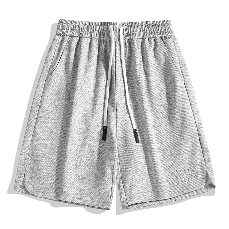 Pantaloncini Casual classici larghi elastici a vita alta da uomo nuovi estivi tasche con coulisse moda pendolare pantaloncini All-match