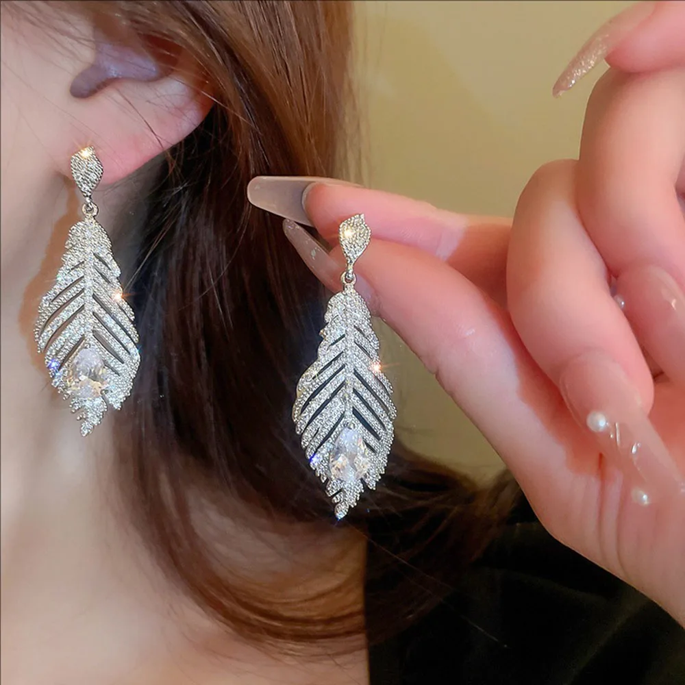

Silvery Needle Crystal-encrusted Zircon Water Drop Feather Earrings Fashionable Light Luxury And High-end Jewelry For Women