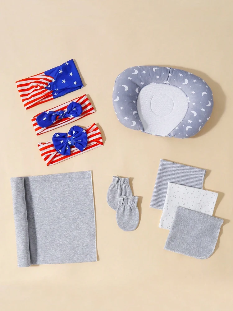 

9pcs baby swaddle blankets, 1 headband, 3 gloves, 1 pair of small square towels, 3 pillows, 1 Child Accessories