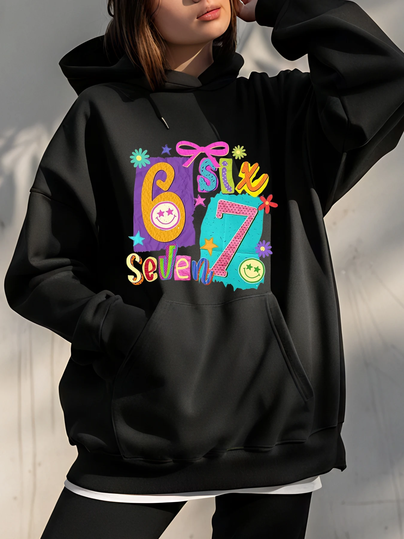 

Black Hoodie with 67 Six Seven Number Print Colorful Design Casual Streetwear Women's Fashion Sweatshirt for Youth and Teens