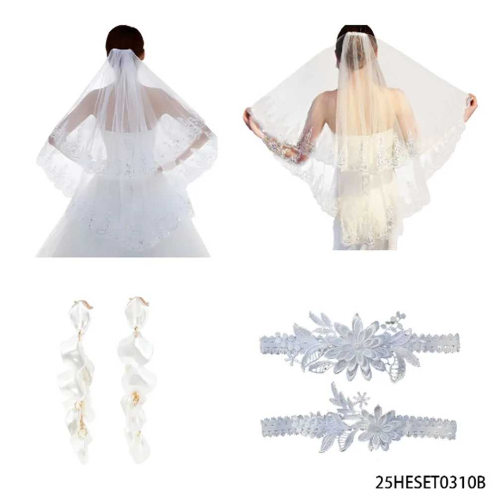 

PESENAR This is a dreamy wedding themed dressing set that includes a veil, tassel earrings, and lace stockings.