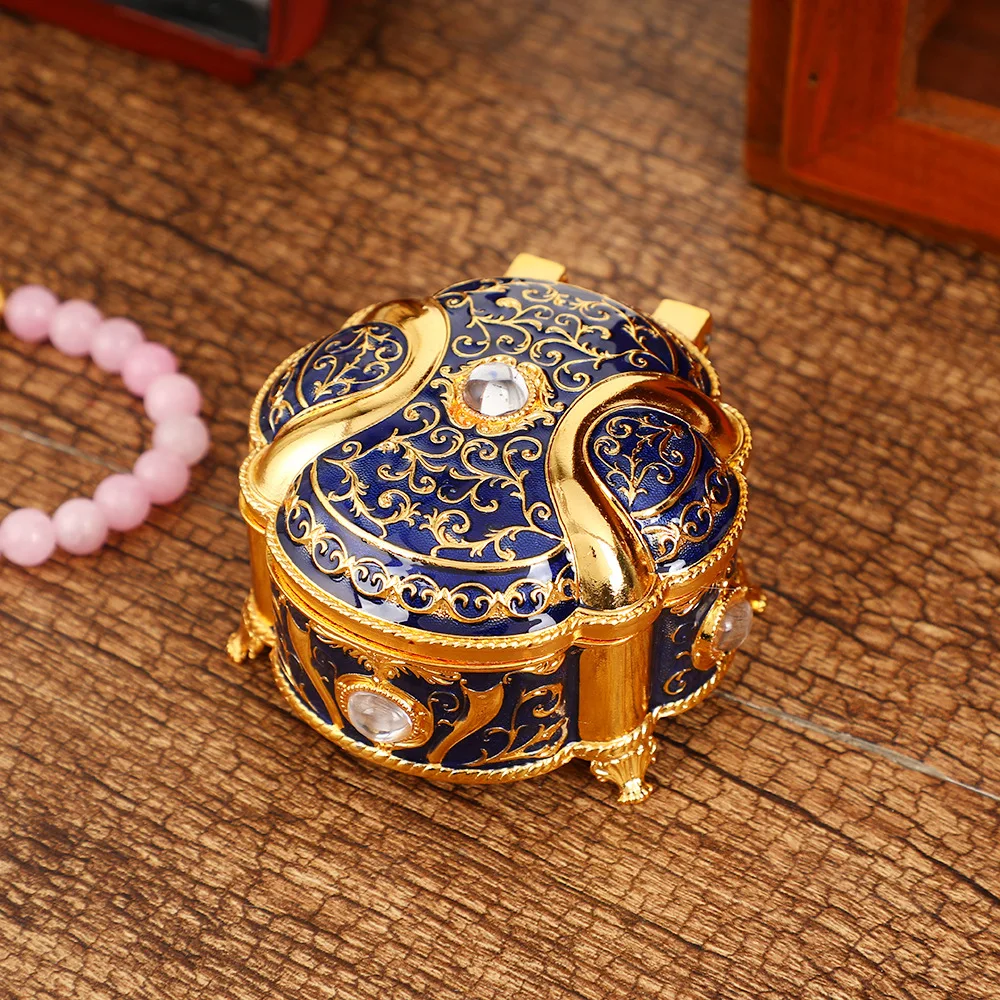 Retro Round Relief Jewelry Box With Exquisite Metal And Diamond Decoration, Creative Flip Cover Pattern, And Ring Storage Box