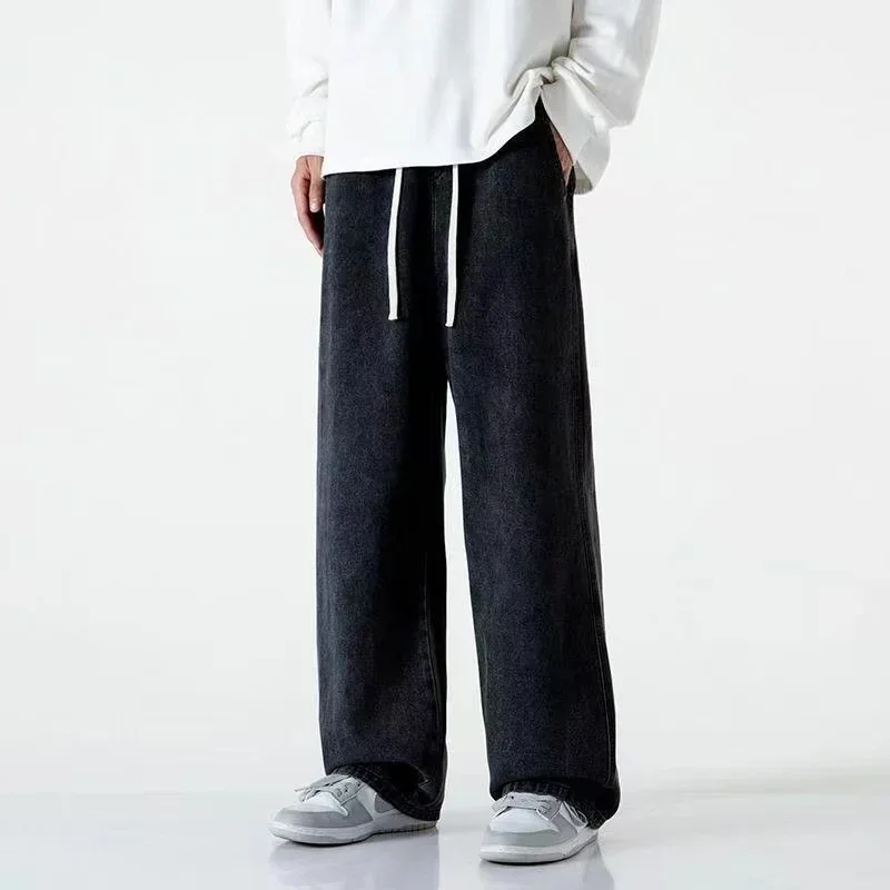 2023 ใหม่แฟชั่นเกาหลีผู้ชายลำลองกางเกงยีนส์คลาสสิกผู้ชายเดนิมทรงตรงกางเกงขากว้างสีฟ้าอ่อนสีเทาสีดำ 3XL