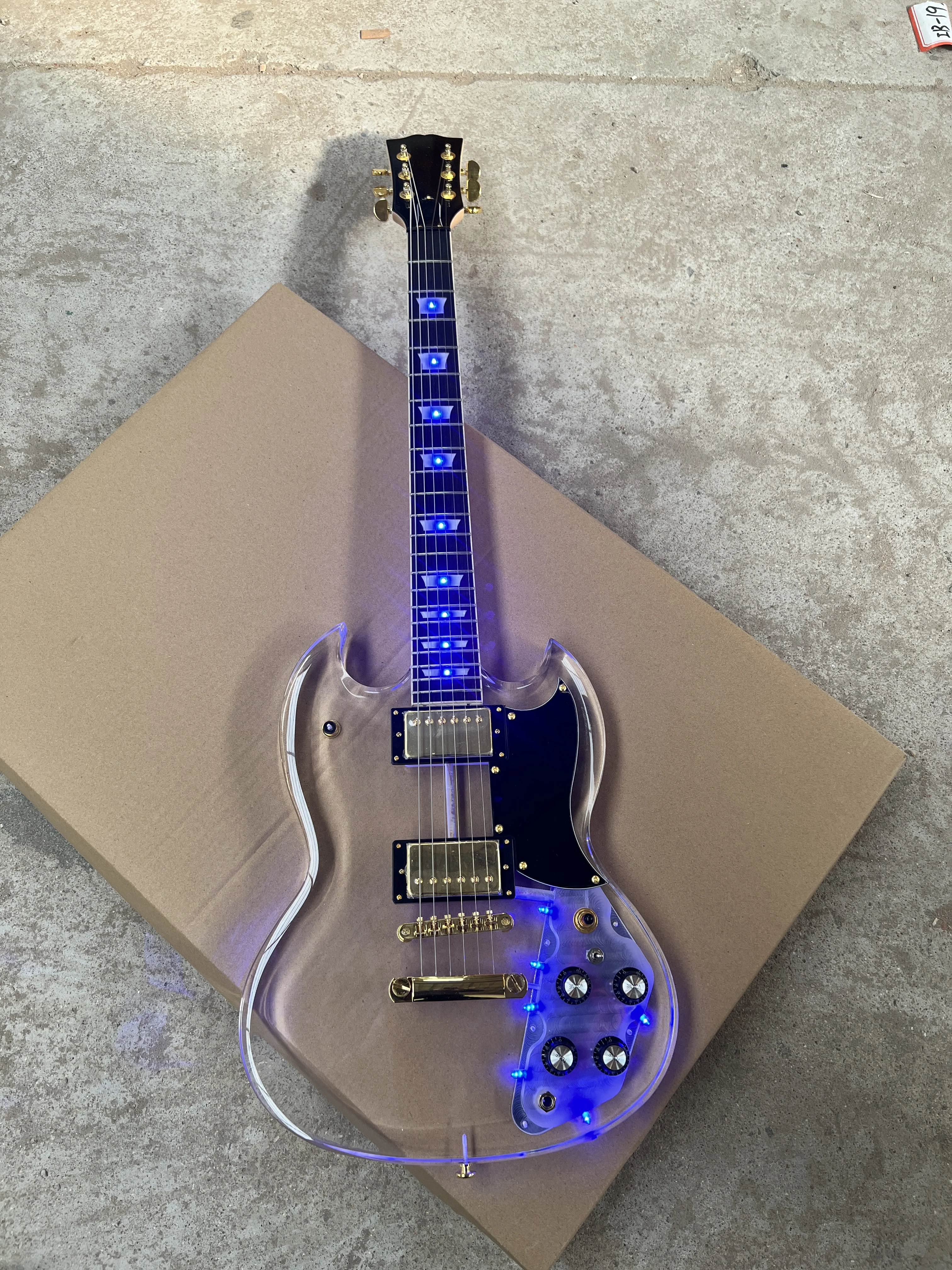 High-quality acrylic Plexiglass clear 6-string electric guitar Blue led lights Gold accessories Free shipping