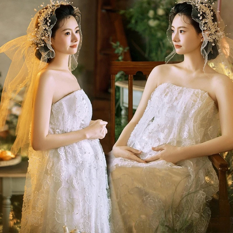 ชุดเดรสยาวสำหรับถ่ายภาพคนท้อง ผ้าลูกไม้สีขาวลายดอกไม้ ดีไซน์หรูหรา เหมาะสำหรับถ่ายภาพในสตูดิโอ
