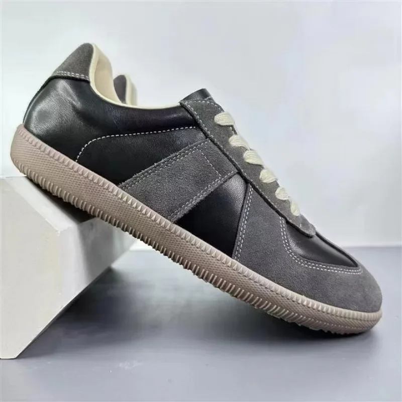 Męskie buty ze skóry naturalnej wiosna/jesień nowy Trend wszechstronne sportowe buty Casual miękkie podeszwa designerskie mokasyny męskie trampki