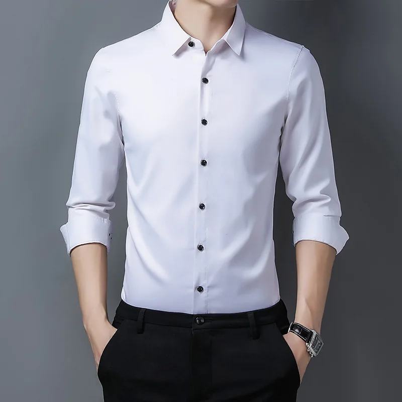 New longsleeved shirt for middle-aged men business slim and non-ironing professional work clothes solid color men\'s white shirt.