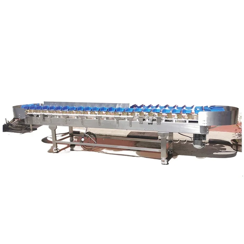 Pesatrice e classificatrice dinamica per piedi di pollo e cosce di pollo