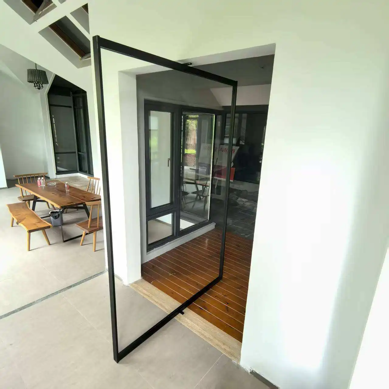 Made in China Simple Design Glass Entrance Door Windproof Rainproof Manual Pivot Door Large Size Noise Reduction Revolving Door
