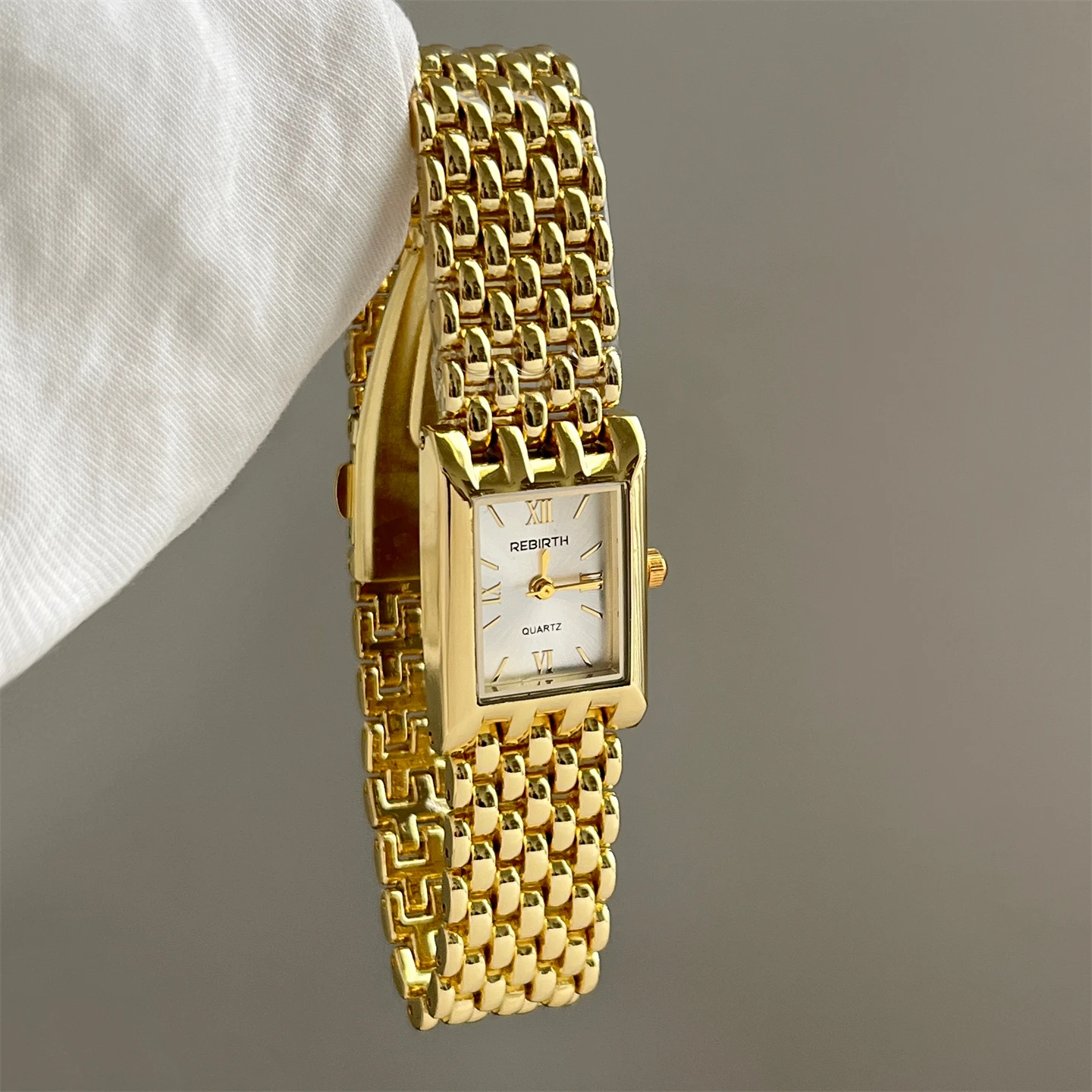 

Stylish, simple, high-end, light luxury small gold watch, women's niche design, women's square quartz watch