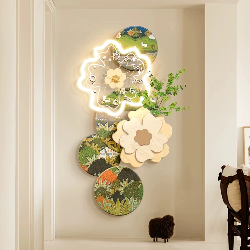 Mid-century modern entryway decor with French clock-inspired wall art and vintage illuminated wall panels
