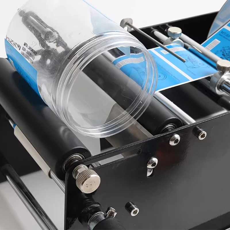 Small Manual Adhesive Round Bottle Round Can Labeling Machine Trademark LOGO Hand Cranked Labeling Machine Glass Bottle Labeler