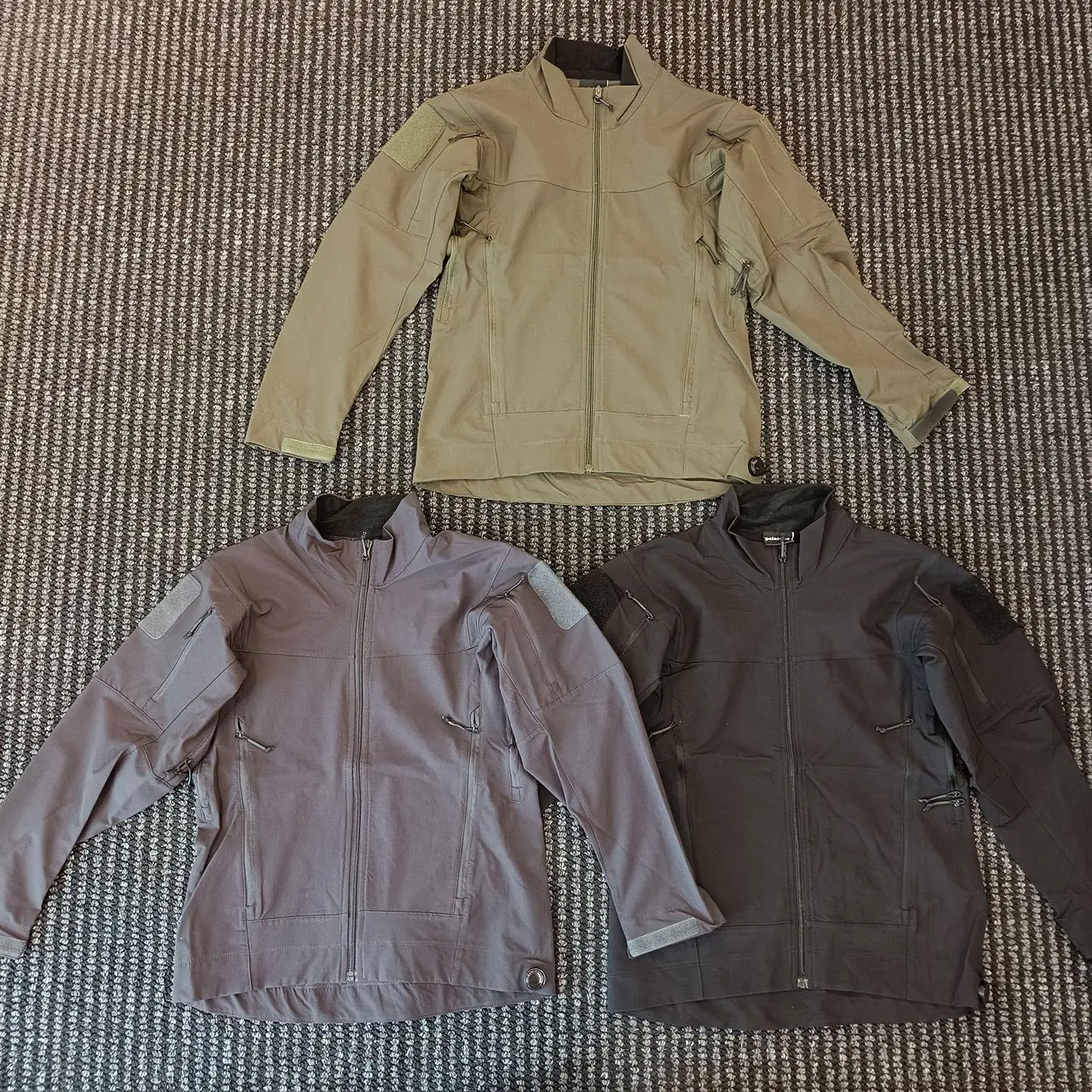 回転バックル締め付けタクティカルジャケット、アメリカンアウトドアタクティカルジャケット、多機能登山ジャケット