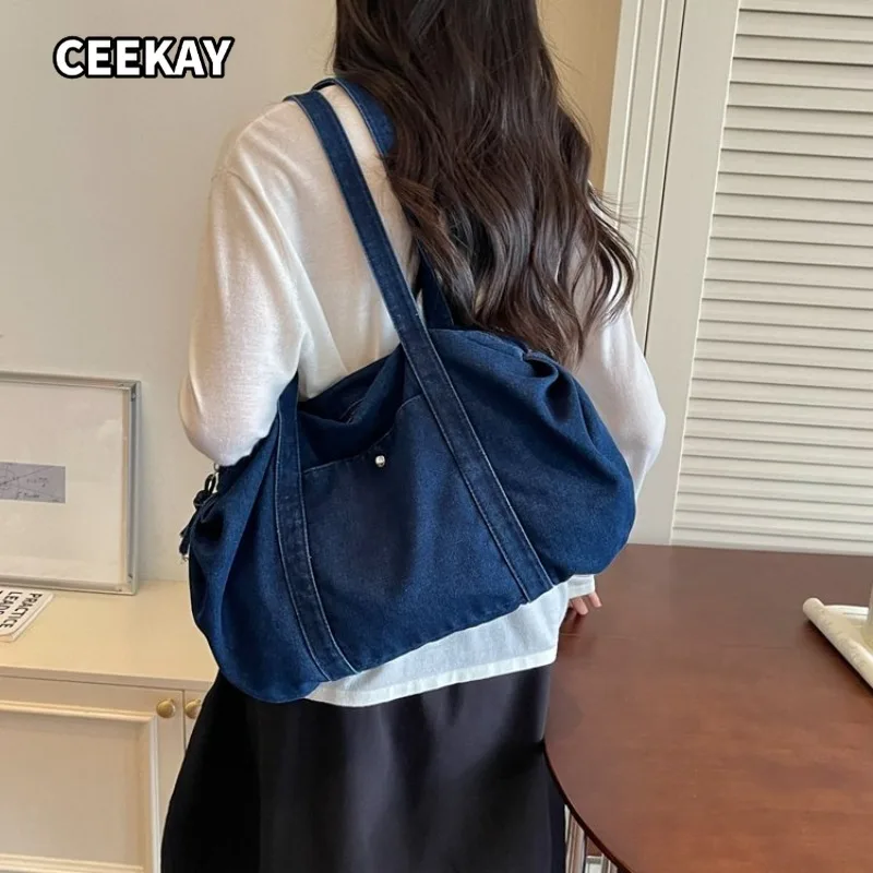 CEEKAY Women's Barrel Bag Light Blue Washed Denim Large Capacity Snap Pocket Shoulder Handbag Everyday Commute Casual Style