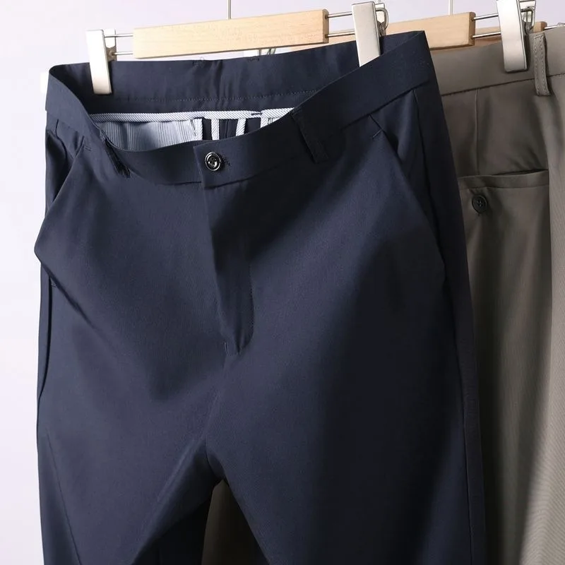 Мужские брюки, эластичные однотонные черные умные повседневные мужские брюки, офисные быстросохнущие брюки, новые весенне-осенние корейские прямые брюки