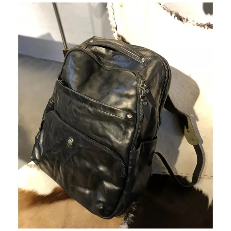 

Vintage luxury top quality genuine leather men's large capacity backpack designer outdoor travel real cowhide big laptop bookbag