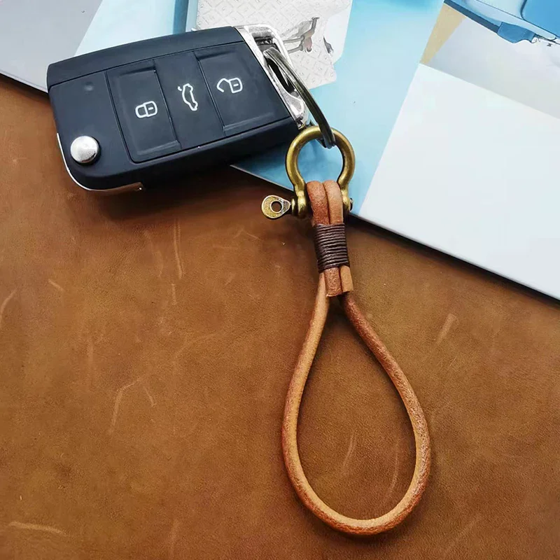 

Винтажный кожаный брелок премиум-класса, сумка, подвеска, мягкая веревка ручной работы, ремешок для мобильного телефона, рюкзак, подвеска, аксессуар, подарок