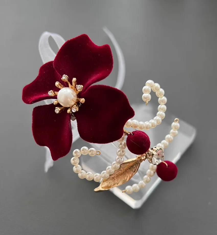 High-end design bridal wrist corsage with velvet rose and metallic wrapping wedding ribbon; bridesmaid and maid of honor floral
