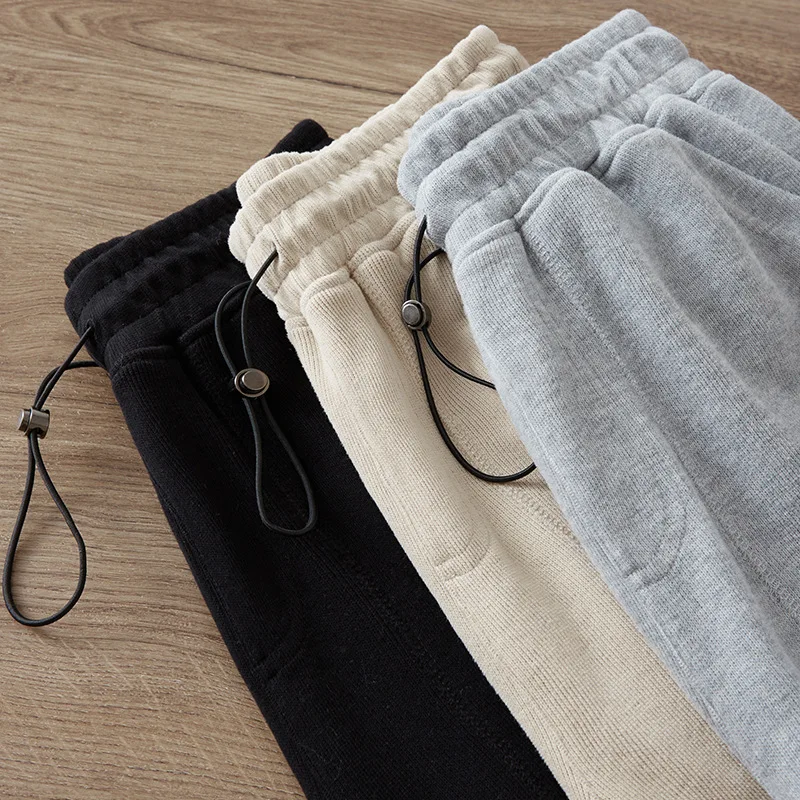 Spring And Summer New Adjustable Drawstring Men\'s Sweatpants Casule Baggy Sports Trousers Men Solid Color Pocket Loose Pants