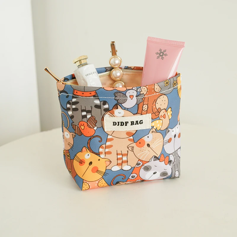 Cosmetic bag small cartoon cat PVC waterproof portable coin purse cosmetics lipstick cushion storage bag commuter clutch makeup