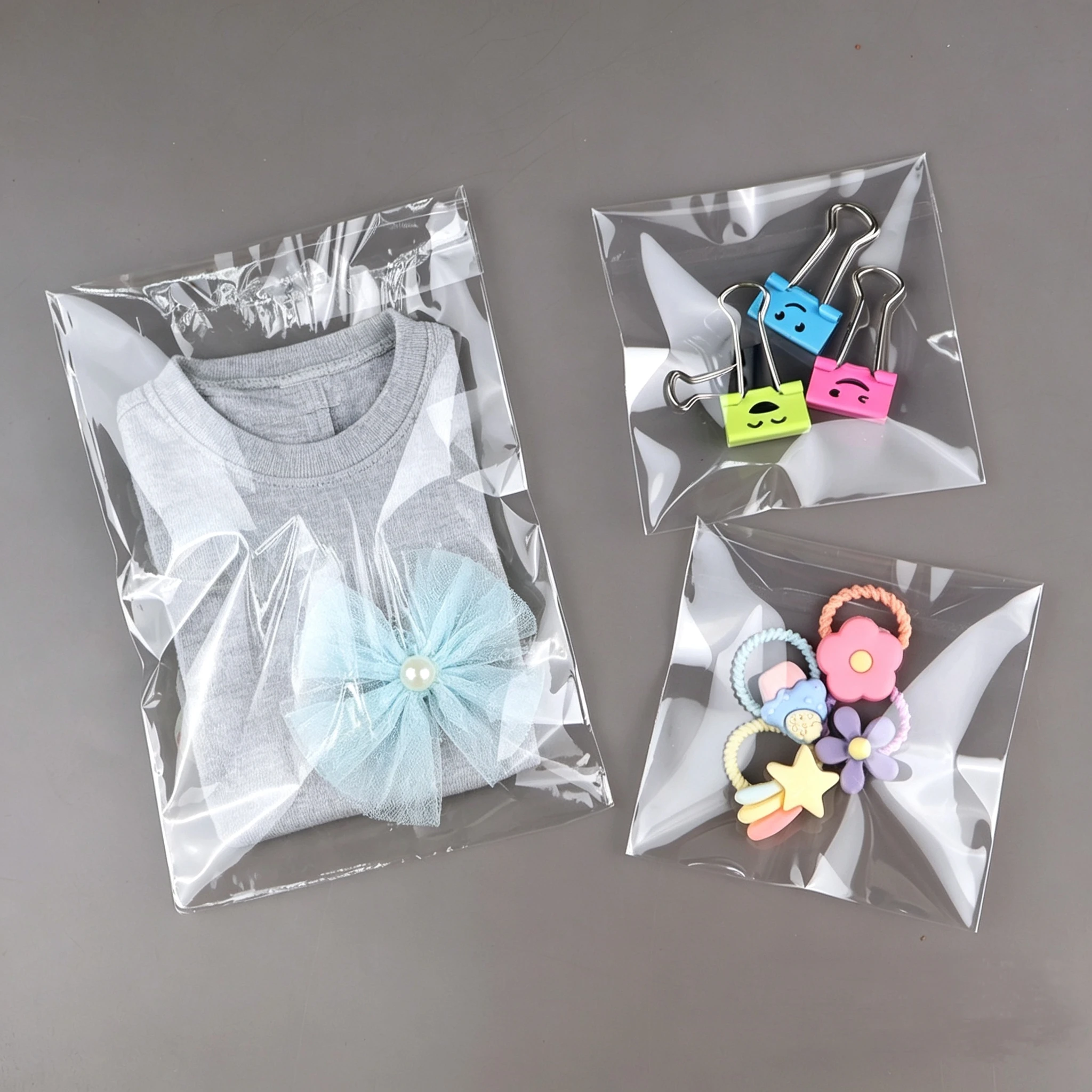 Große Größen OPP Transparente Selbstklebende Versiegelte Plastikverpackungsbeutel Wiederverschließbare Kleiderbeutel OPP-Beutel Geschenkbeutel – Detail 8