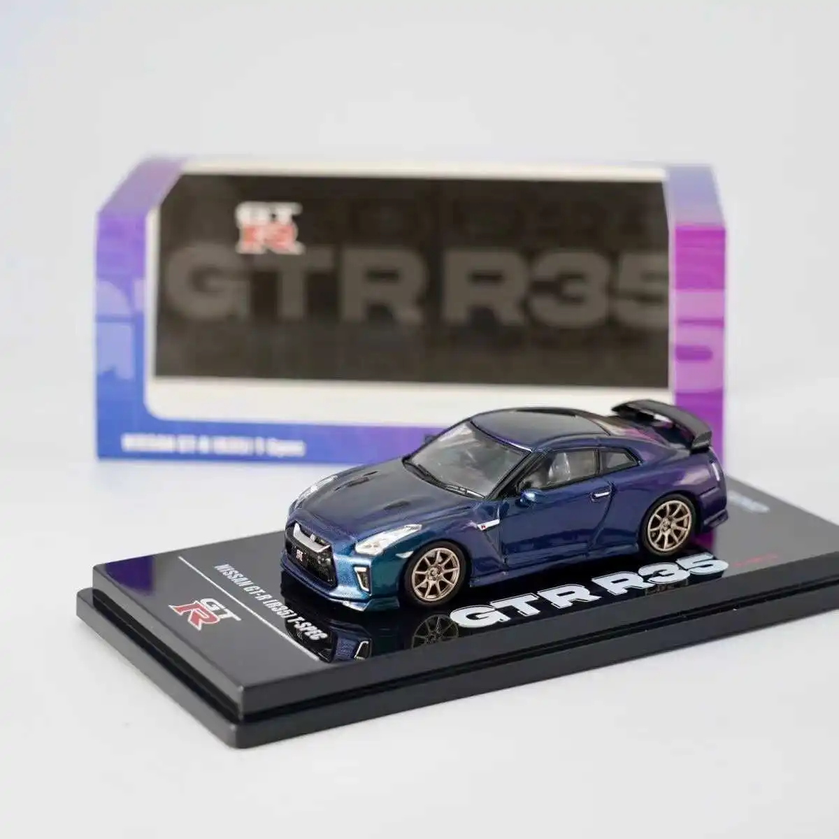 1:64 Nissan GT-R R35 God of War T-SPEC diecast alloy model, children's collection of decorative toys, holiday gifts for children