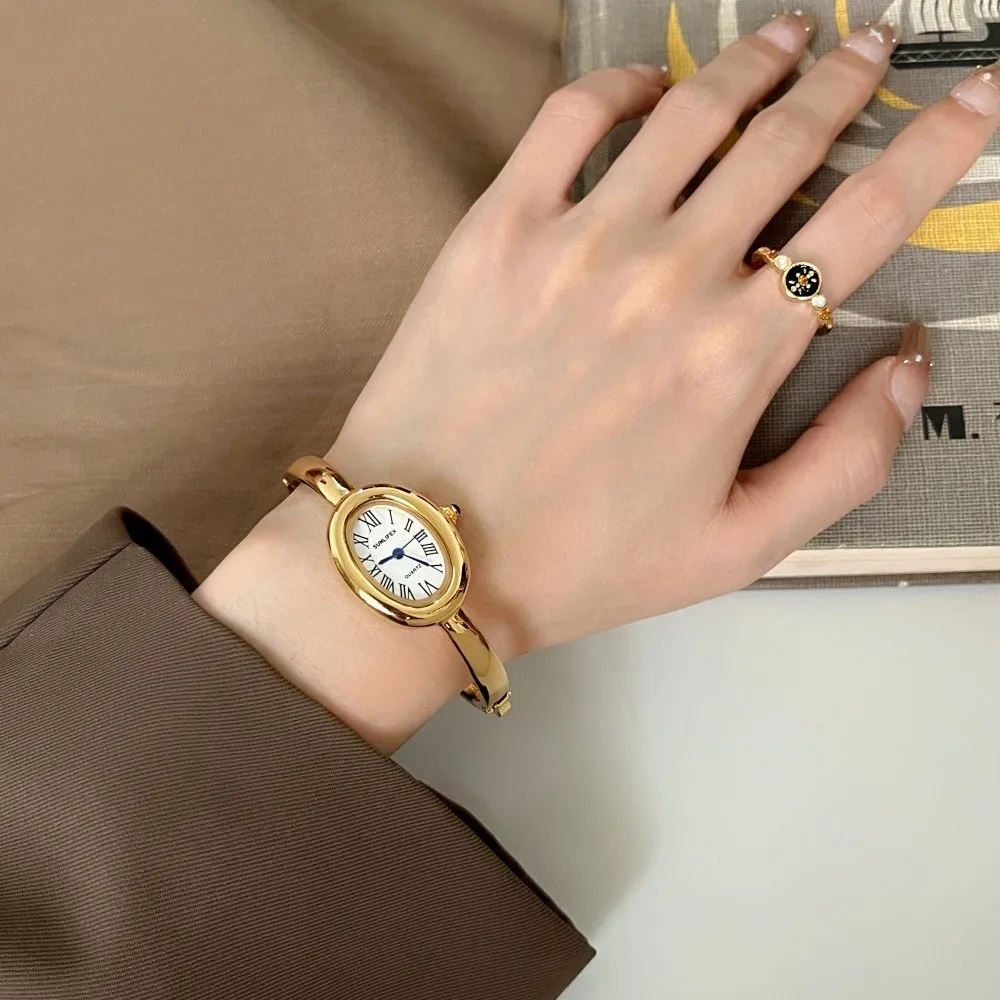 Reloj de bañera para mujer, pulsera de Metal redonda de lujo con luz de oro rosa de alta gama, relojes de pulsera de cuarzo a la moda para mujer, regalo de joyería