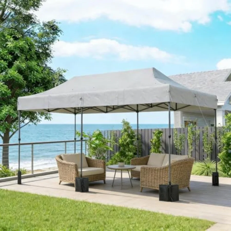 Outdoor pop-up canopy tent for instant shelter, durable polyester fabric, neutral gray color, quick-setup and wind-resistant de