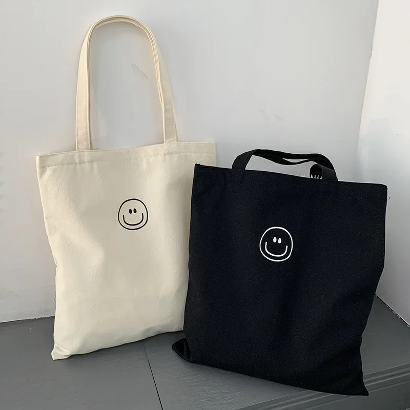 Borsa a tracolla di grande capacità borse a tracolla in tela con faccia sorridente di moda per le donne borsa con cerniera per studenti Casual con