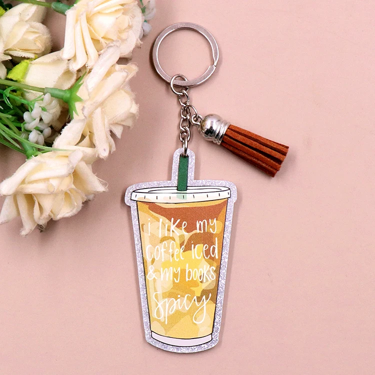 القهوة المثلجة كتاب عاشق العصرية هدية عيد المعلم الشريط الوعي بريق التفاح سلسلة مفاتيح مصنوعة من الأكريليك مع شرابة