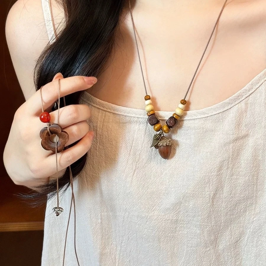 Vintage forest style wooden acorn necklace female niche Zen ethnic style sweater chain long pendant accessories