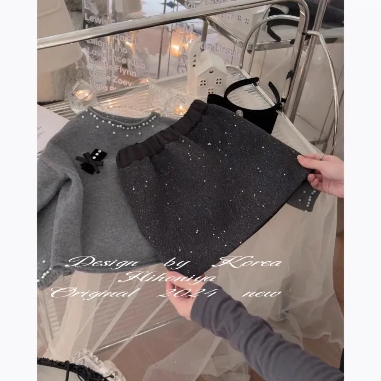 تنورة صوفية مطرزة للفتيات لخريف وشتاء 2025 تنورة بناتي كورية جديدة على الموضة تنورة فتاة على شكل حرف A