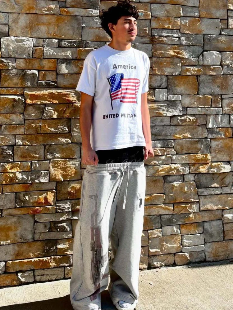 Graue, sprühbedruckte Hose mit Reißverschluss und Kordelzug, bodenlange Freizeithose, kurze Streetstyle-Hose für Herren und Damen