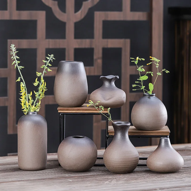 Simple and retro flowerware. Japanese ceramic vase. Thick earthenware flower holder. Modern home decoration. Flower arrangement