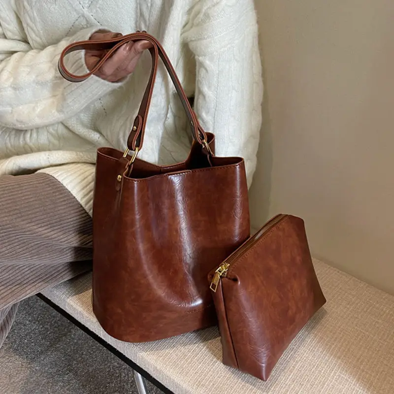 

Ручная сумка-ведро в стиле ретро, женская кожаная большая вместительная композитная сумка на плечо, женская модная роскошная дизайнерская сумка подмышками 2025