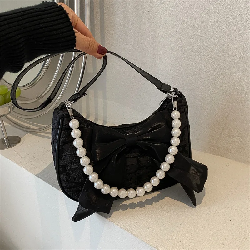 Fashionable and portable bow single shoulder pearl bag with 1 detachable pearl strap