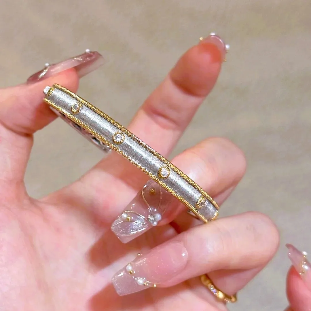 

Women Italian Buccella Woven Engraved Gold bracelet 2024