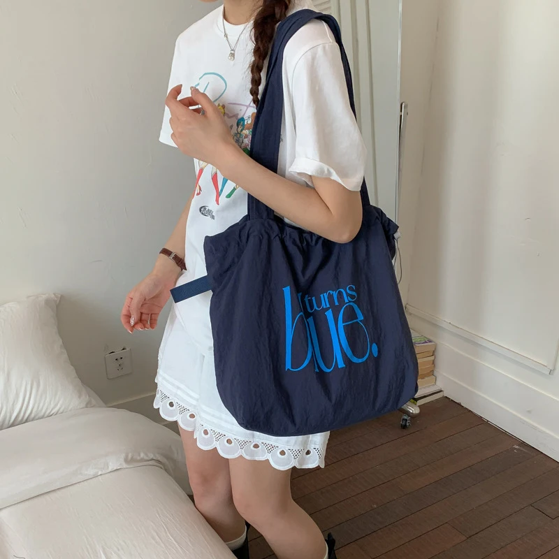 

New Korean Single Strap Drawstring Nylon Tote Large Capacity Minimalist Letter Print Unique Women's Bag