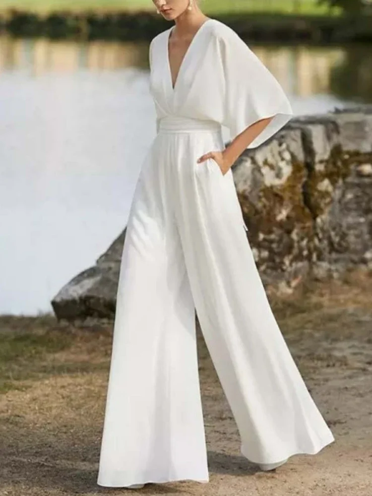 

2024 winter Europe and the United States new women's dress jumpsuit burst deep V high waist wide leg pants